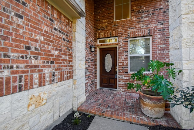 28015 Silverstream Ct, Fulshear, TX 77441 - property entrance with brick siding