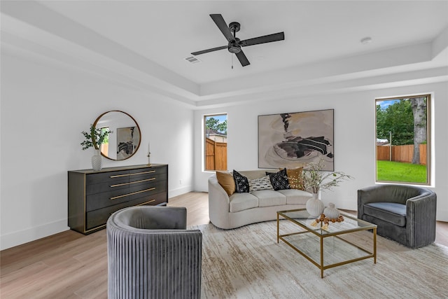 2031 Peppermill Rd, Houston, TX 77080 - living area with a raised ceiling, healthy amount of natural light, and light wood-type flooring