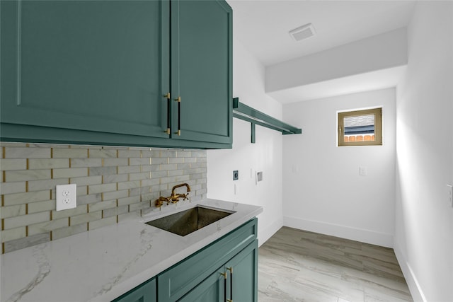 2031 Peppermill Rd, Houston, TX 77080 - laundry area with a sink and baseboards