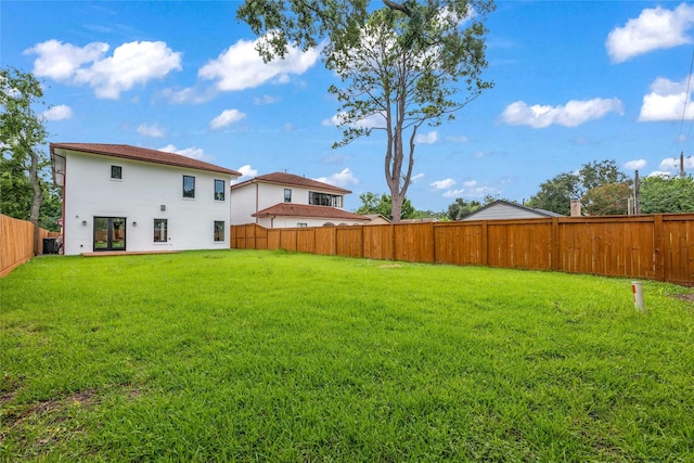 2031 Peppermill Rd, Houston, TX 77080 - fenced backyard featuring french doors