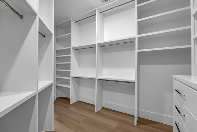 2031 Peppermill Rd, Houston, TX 77080 - walk in closet featuring light wood finished floors