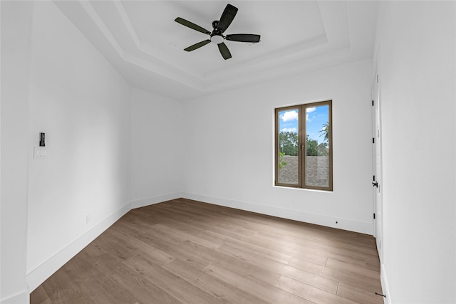 2031 Peppermill Rd, Houston, TX 77080 - empty room with a raised ceiling, wood finished floors, and ceiling fan