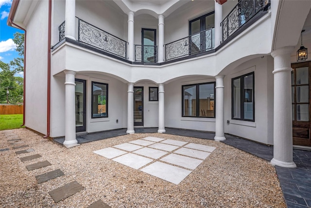 2031 Peppermill Rd, Houston, TX 77080 - back of property with a balcony, stucco siding, and a patio