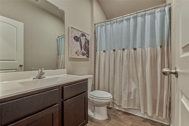 11503 Parrot Fish Ct, Conroe, TX 77304 - full bath with vanity, wood finished floors, and a shower with curtain