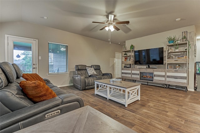 11503 Parrot Fish Ct, Conroe, TX 77304 - living area with a ceiling fan, wood finished floors, and lofted ceiling