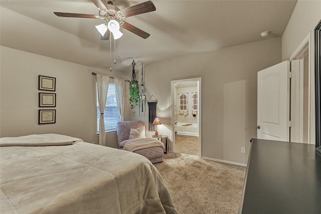 11503 Parrot Fish Ct, Conroe, TX 77304 - carpeted bedroom featuring connected bathroom and ceiling fan