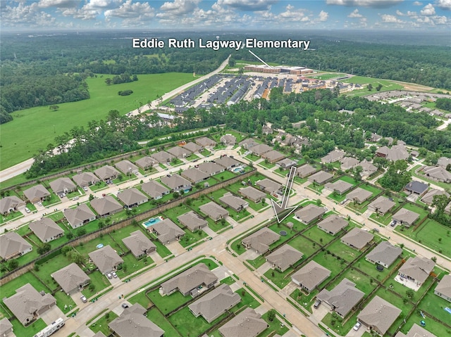11503 Parrot Fish Ct, Conroe, TX 77304 - aerial view of property and surrounding area featuring a forest and nearby suburban area