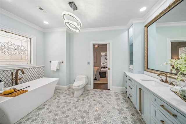1114 W Cottage St, Houston, TX 77009 - ensuite bathroom with vanity, ornamental molding, a freestanding tub, healthy amount of natural light, and recessed lighting