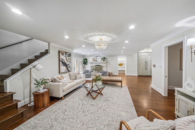 1114 W Cottage St, Houston, TX 77009 - living area featuring stairway, recessed lighting, dark wood-style flooring, ornamental molding, and a fireplace