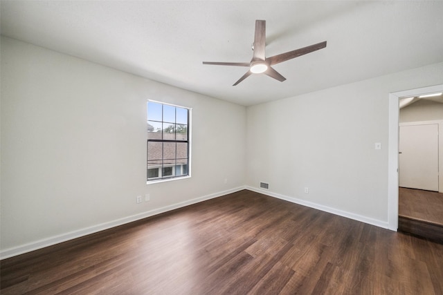 1114 W Cottage St, Houston, TX 77009 - spare room with a ceiling fan and dark wood-style floors