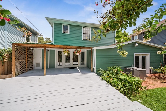 1114 W Cottage St, Houston, TX 77009 - wooden deck featuring french doors