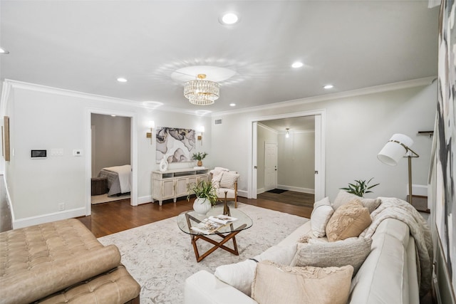 1114 W Cottage St, Houston, TX 77009 - living room featuring crown molding, dark wood-style flooring, recessed lighting, and a chandelier