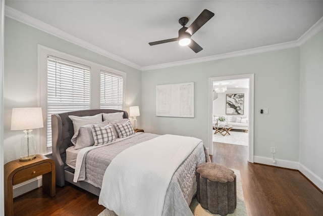 1114 W Cottage St, Houston, TX 77009 - bedroom featuring ornamental molding, dark wood-type flooring, and a ceiling fan