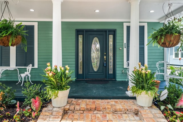 1114 W Cottage St, Houston, TX 77009 - doorway to property featuring covered porch