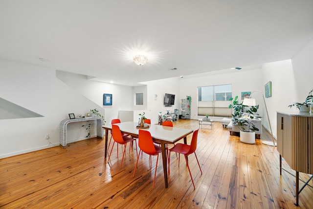 1821 Tuam St, Houston, TX 77004 - dining room with light wood-style flooring
