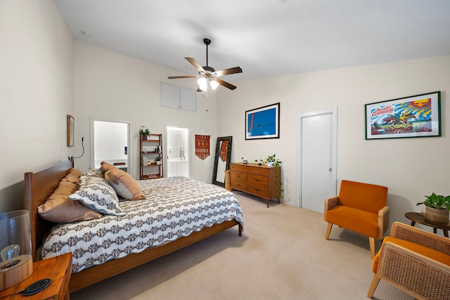 1821 Tuam St, Houston, TX 77004 - bedroom featuring vaulted ceiling, light carpet, and a ceiling fan