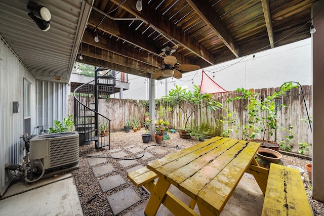 1821 Tuam St, Houston, TX 77004 - fenced backyard with a ceiling fan and a patio area