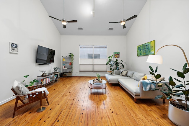 1821 Tuam St, Houston, TX 77004 - living room with high vaulted ceiling, ceiling fan, and wood-type flooring