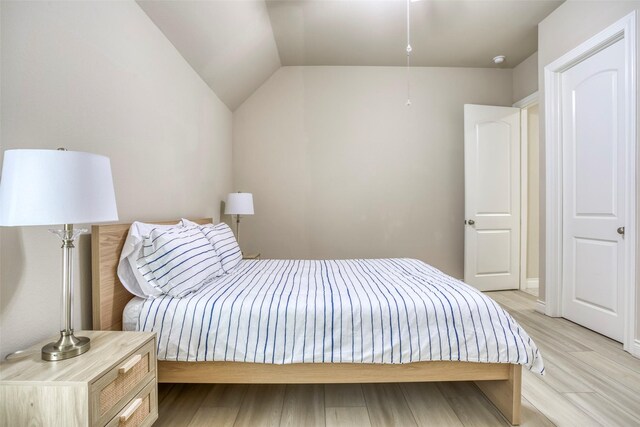 29114 Davenport Dr, Katy, TX 77494 - bedroom with light wood finished floors and lofted ceiling