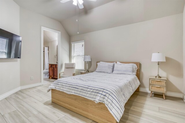 29114 Davenport Dr, Katy, TX 77494 - bedroom featuring light wood-type flooring, lofted ceiling, connected bathroom, and ceiling fan