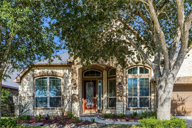 29114 Davenport Dr, Katy, TX 77494 - property entrance featuring brick siding and an attached garage