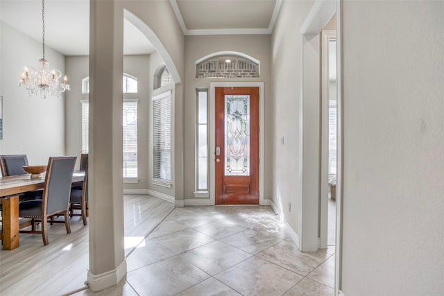 29114 Davenport Dr, Katy, TX 77494 - foyer with plenty of natural light, a chandelier, ornamental molding, and arched walkways