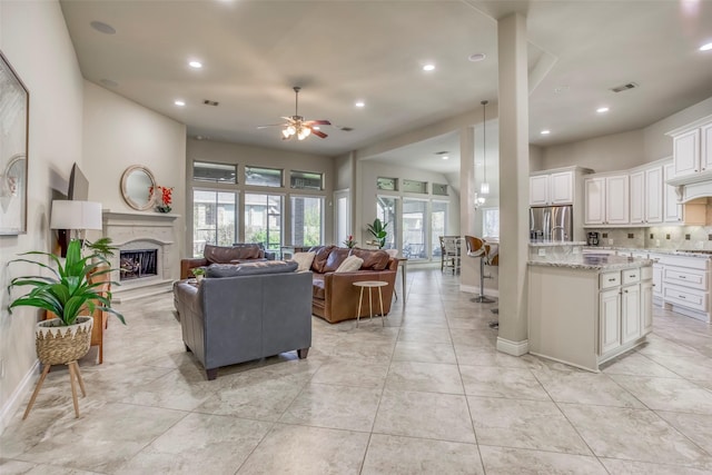 29114 Davenport Dr, Katy, TX 77494 - living area featuring ceiling fan, recessed lighting, and a premium fireplace