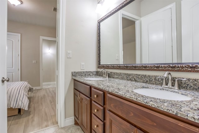 29114 Davenport Dr, Katy, TX 77494 - full bathroom with double vanity and baseboards