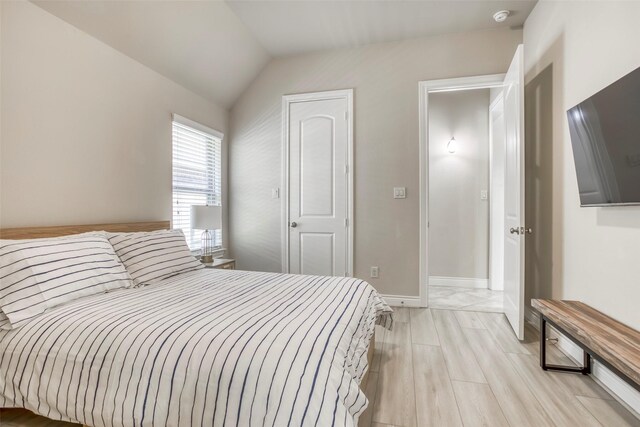 29114 Davenport Dr, Katy, TX 77494 - bedroom featuring lofted ceiling and baseboards