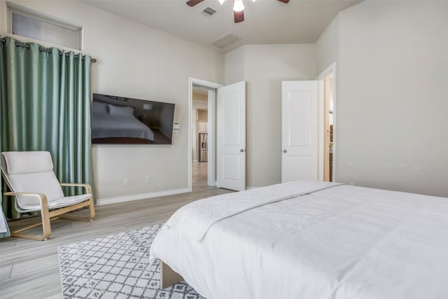 29114 Davenport Dr, Katy, TX 77494 - bedroom with wood finished floors and a ceiling fan