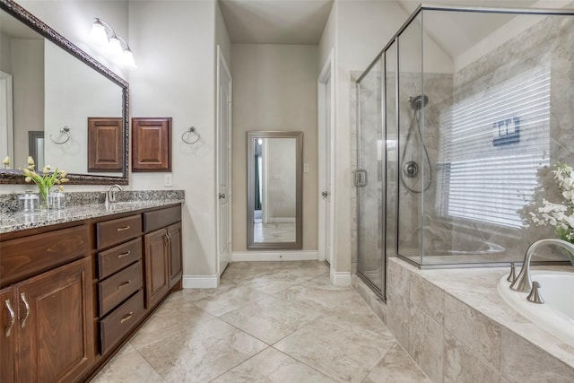 29114 Davenport Dr, Katy, TX 77494 - full bathroom featuring vanity, a bath, and a stall shower
