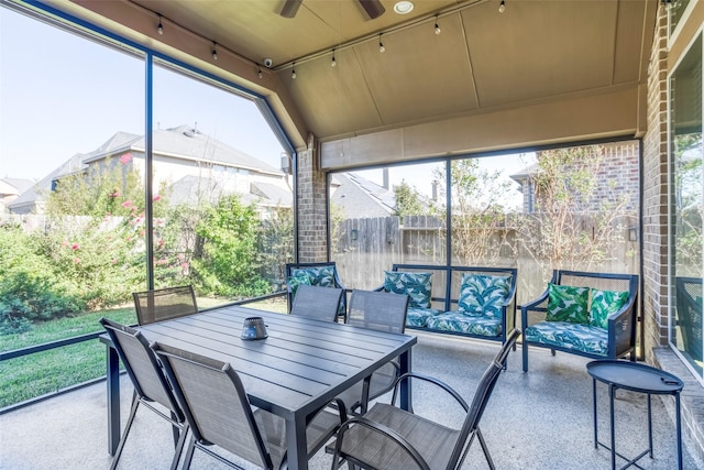 29114 Davenport Dr, Katy, TX 77494 - sunroom / solarium with a ceiling fan, rail lighting, and outdoor lounge area