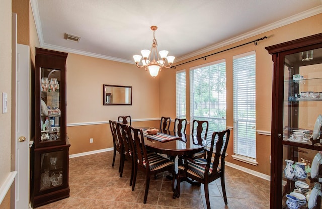 20303 Misty River Way, Cypress, TX 77433 - tiled dining room with ornamental molding, a chandelier, and healthy amount of natural light