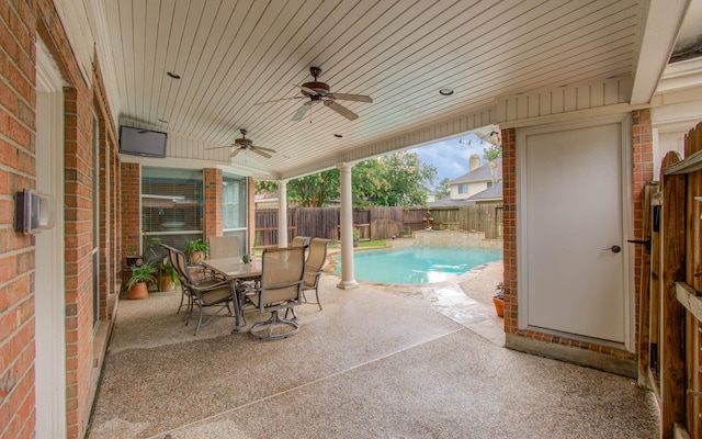 20303 Misty River Way, Cypress, TX 77433 - fenced backyard with a patio, a ceiling fan, and outdoor dining space
