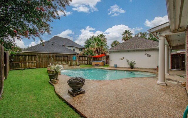 20303 Misty River Way, Cypress, TX 77433 - view of swimming pool featuring a patio area, a fenced backyard, and a hot tub