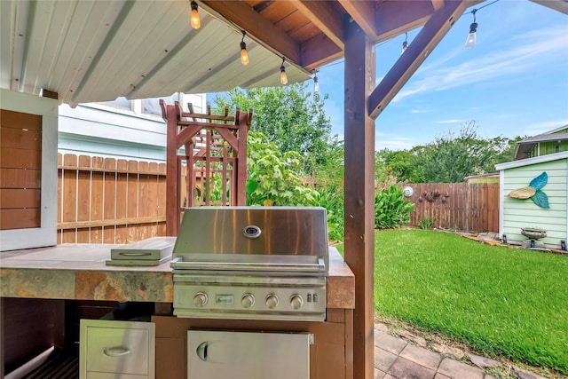 902 Grove Rd, Clear Lake Shores, TX 77565 - view of patio / terrace featuring exterior kitchen