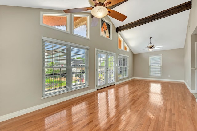 902 Grove Rd, Clear Lake Shores, TX 77565 - unfurnished room with a ceiling fan, high vaulted ceiling, light wood-style flooring, healthy amount of natural light, and beam ceiling