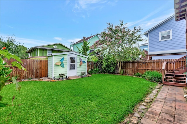 902 Grove Rd, Clear Lake Shores, TX 77565 - fenced backyard featuring a storage unit