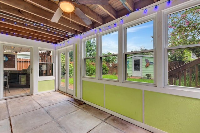 902 Grove Rd, Clear Lake Shores, TX 77565 - unfurnished sunroom with a ceiling fan and concrete floors