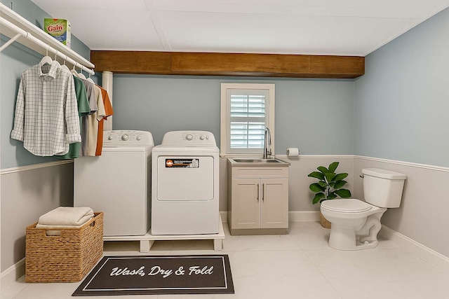 902 Grove Rd, Clear Lake Shores, TX 77565 - laundry room with washer and dryer and tile patterned flooring