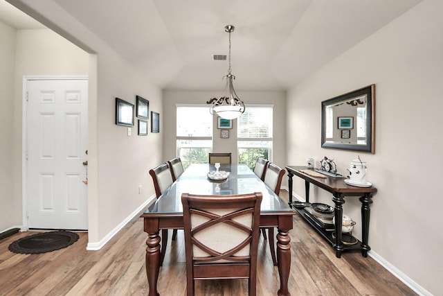 32726 Timber Point Dr, Brookshire, TX 77423 - dining area with light wood-style flooring and vaulted ceiling