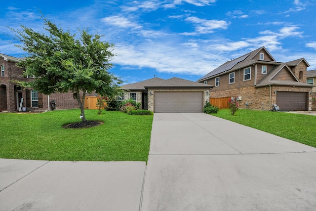32726 Timber Point Dr, Brookshire, TX 77423 - view of front of house with brick siding, a garage, a front lawn, and concrete driveway