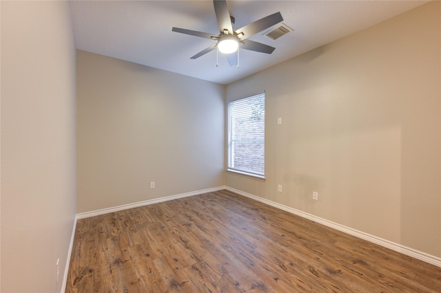 18511 Yellowstone Trl, Humble, TX 77346 - empty room featuring a ceiling fan and wood finished floors