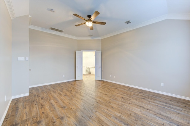 18511 Yellowstone Trl, Humble, TX 77346 - empty room with a ceiling fan, light wood-type flooring, crown molding, and a smoke detector