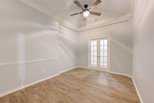 18511 Yellowstone Trl, Humble, TX 77346 - spare room featuring ceiling fan, ornamental molding, wood finished floors, and french doors