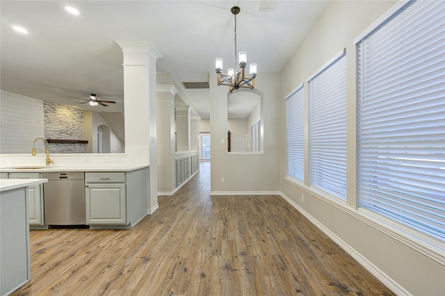 18511 Yellowstone Trl, Humble, TX 77346 - unfurnished dining area with a ceiling fan, light wood finished floors, a chandelier, and recessed lighting