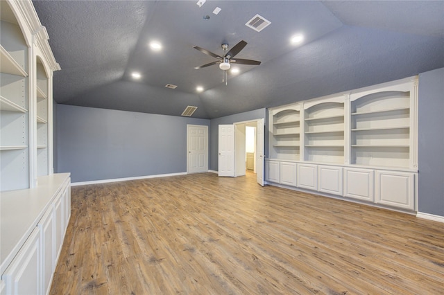 18511 Yellowstone Trl, Humble, TX 77346 - unfurnished room with lofted ceiling, ceiling fan, light wood finished floors, and built in features