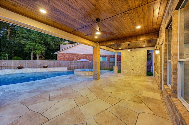 18511 Yellowstone Trl, Humble, TX 77346 - fenced backyard with ceiling fan, a patio, and a pool with connected hot tub
