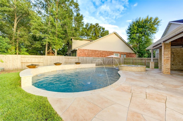 18511 Yellowstone Trl, Humble, TX 77346 - view of pool with a patio, a fenced backyard, and a pool with connected hot tub
