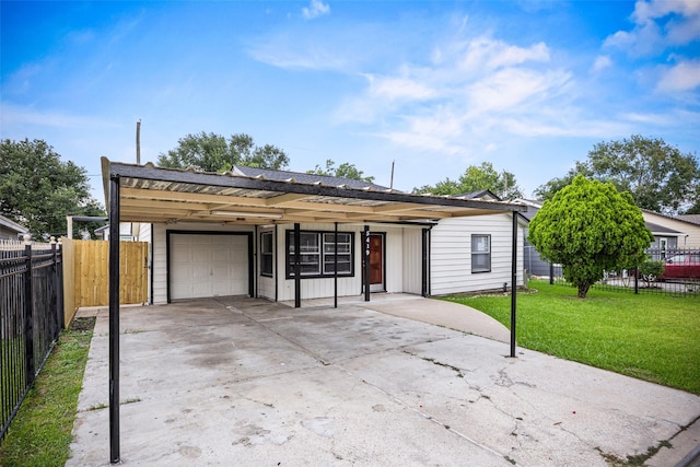 5419 Firefly Ave, Houston, TX 77017 - view of front of home featuring a garage, concrete driveway, and a carport